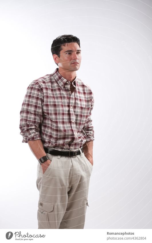 Joyful male model posing standing on one foot Royalty-Free Stock Image -  Storyblocks