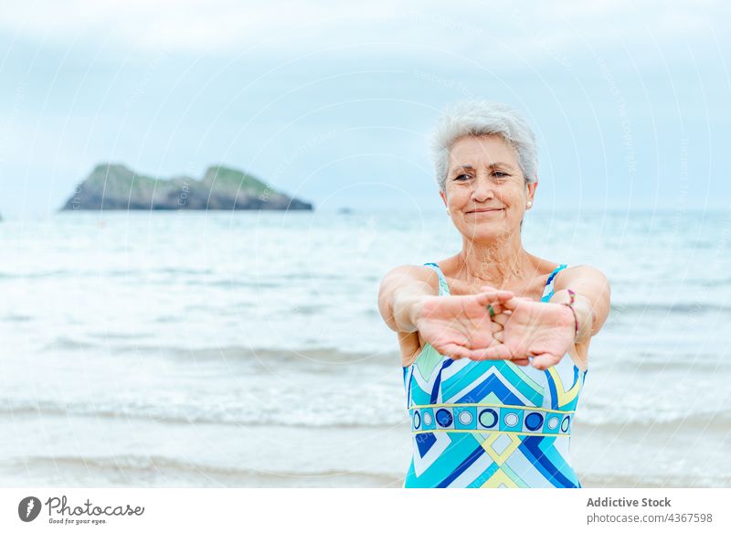 Fitness, woman and portrait smile stretching arms for exercise, start or  workout in nature. Happy and fit female smiling in warm up arm stretch for  training preparation or healthy wellness outdoors