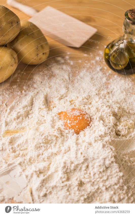 Ingredients for pasta on table ingredient kitchen cook egg yolk flour potato oil prepare food dough raw cuisine recipe culinary gnocchi wheat homemade meal