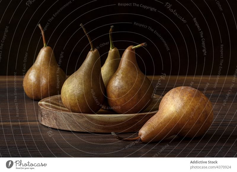 Platter Of Pears isolated fruit pear fresh food background organic white healthy diet closeup ripe vegetarian green raw slice sweet whole cut summer vitamin