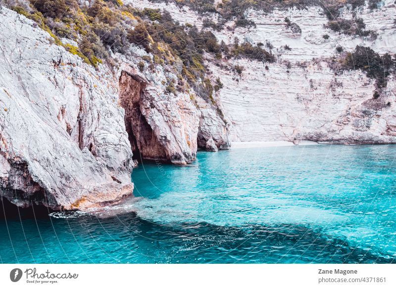 Rock Cliffs and Clear Water at Mediterranean Sea Coast. Greece
