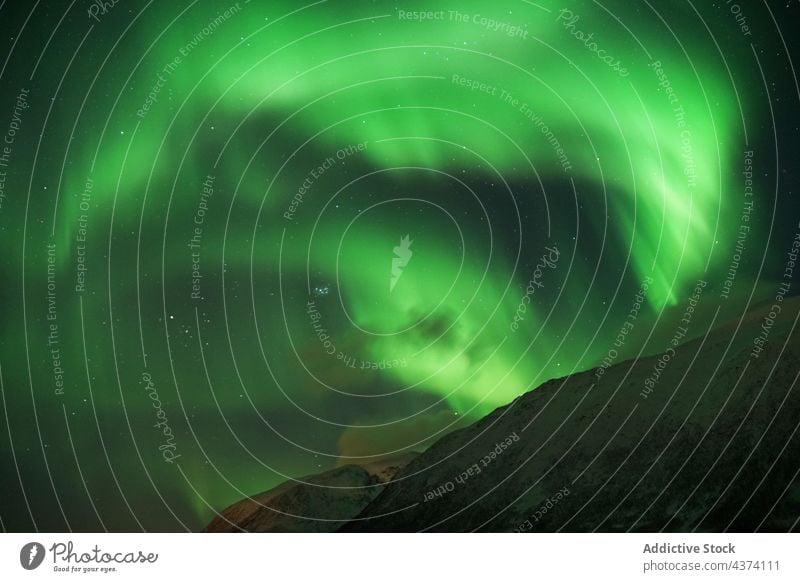 Spectacular Northern Lights in Tromso northern lights aurora borealis Kattfjorden Kvalya Island region Norway winter night landscape iceland space sky astronomy