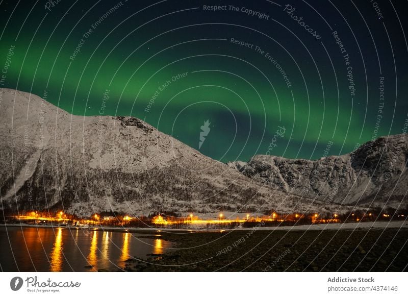 Spectacular Northern Lights in Tromso northern lights aurora borealis Kattfjorden Kvalya Island region Norway winter night landscape iceland space sky astronomy