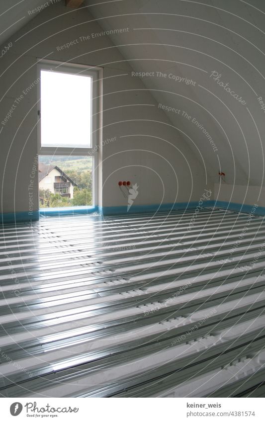 Underfloor heating in the interior of a house under construction underfloor heating heating engineering Apartment Building Energy industry Heating Energy crisis
