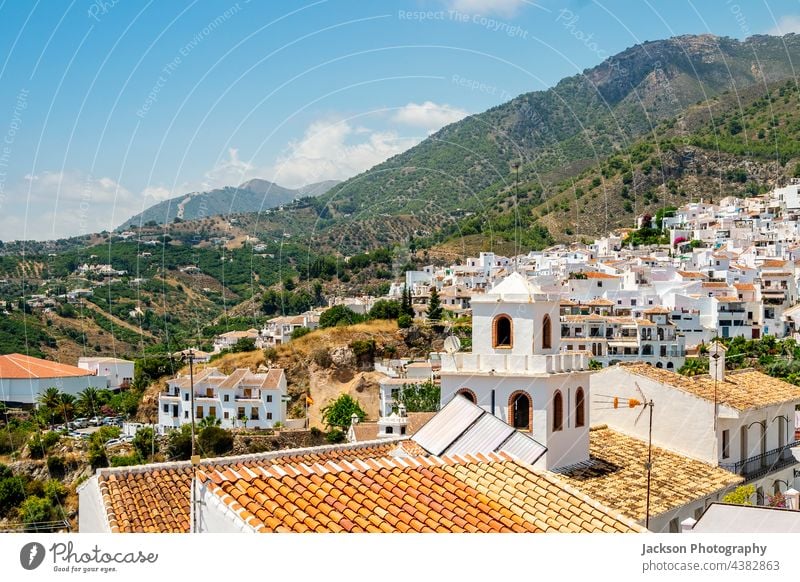 Picturesque town of Frigiliana located in mountainous region of Malaga, Andalusia, Spain frigiliana andalusia spain street picturesque washed white houses