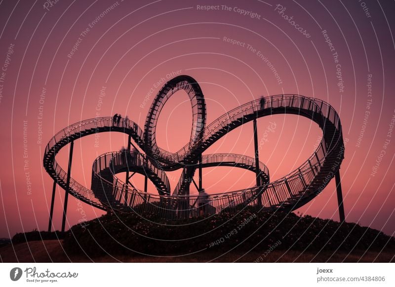 Curved steel staircase in front of red evening sky, long exposure Tiger and Turtle Work of art Stairs Steel Metal Arch curvy Round evening mood Construction