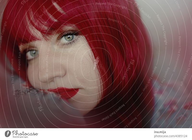 Portrait of a redheaded woman Sadness Red-haired frown Bangs Human being Feminine Hair and hairstyles Adults Young woman portrait Long-haired pretty Face Woman