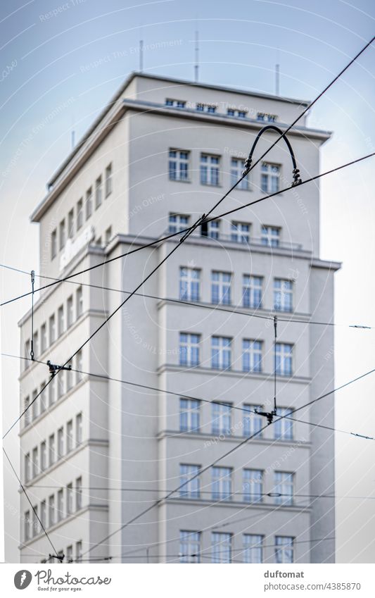 Power line in front of high-rise building at Albertplatz in Dresden High-rise Architecture Prefab construction Facade Window GDR Manmade structures Gloomy