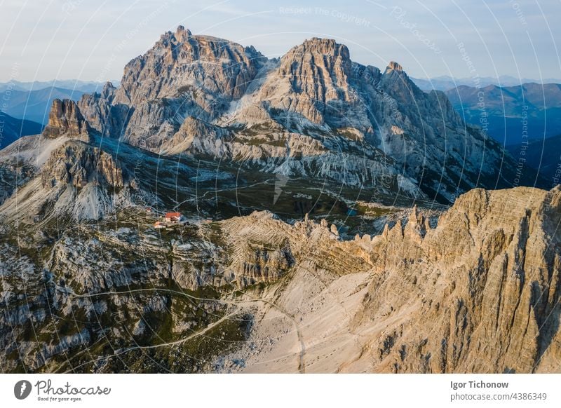 Incredible nature aerial landscape around famous Tre Cime di Lavaredo. Rifugio Antonio Locatelli alpine hut popular travel destination in the Dolomites, Italy