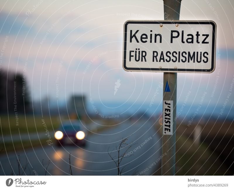 No place for racism, sign on a busy street. Statement against racism Racism Humanity street sign Human rights Society Politics and state Solidarity