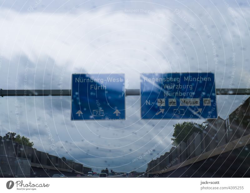 A3/A73: Motorway junction in heavy rain Highway Traffic infrastructure Road sign Double exposure Windscreen Rain Drop Clouds Bad weather Direction Cities