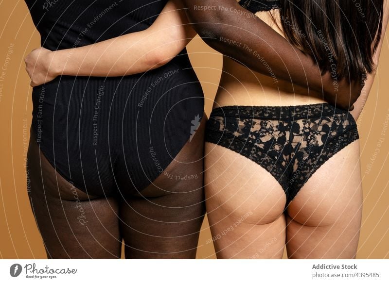 Plus size black model in underwear Stock Photo by ADDICTIVE_STOCK
