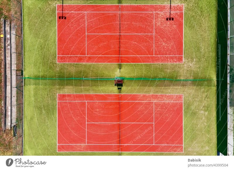 Aerial view of two tennis courts aerial view sport game play stadium field grass ground texture background lawn green turf top line pattern playground goal