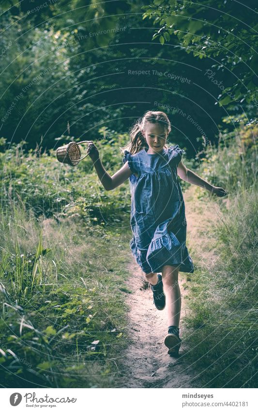 Girl with basket runs through the forest Child childhood Children's game Freedom Nature nature lovers Childhood memory Infancy Playing Joy Leisure and hobbies