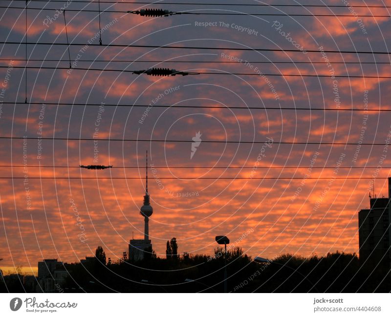 Evening light over the big city Berlin TV Tower Landmark Capital city Sky Clouds evening mood Overhead line Silhouette Prenzlauer Berg City Panorama (View)