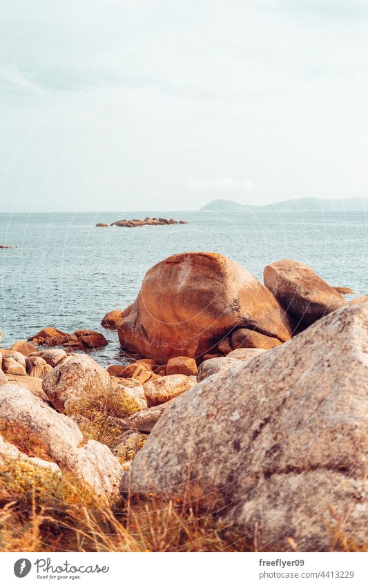 Landscape of a mediterranean coastline sea seascape rocks granite horizon copy space nobody beach scenic landscape day cliff nature water ocean travel storm