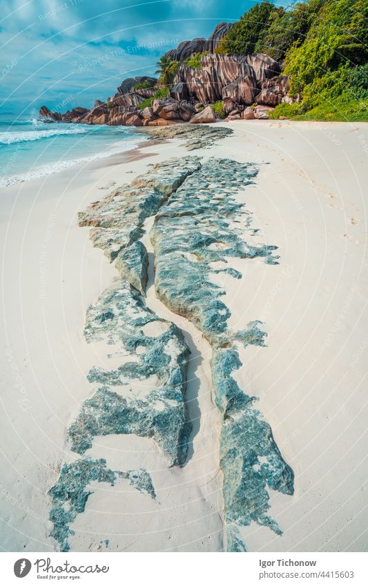 Tropical beach at Grand Anse, La Digue island, Seychelles. Beautifully shaped granite boulders, white sand and blue ocean digue la digue anse paradise travel