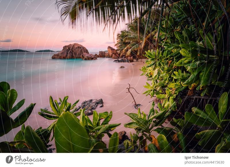 Paradise exotic beach on La Digue Island, Seychelles. Long Exposure during amazing sunset long long exposure light digue island paradise seychelles anse