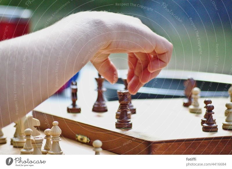 Girl and boy playing chess at home. - a Royalty Free Stock Photo from  Photocase