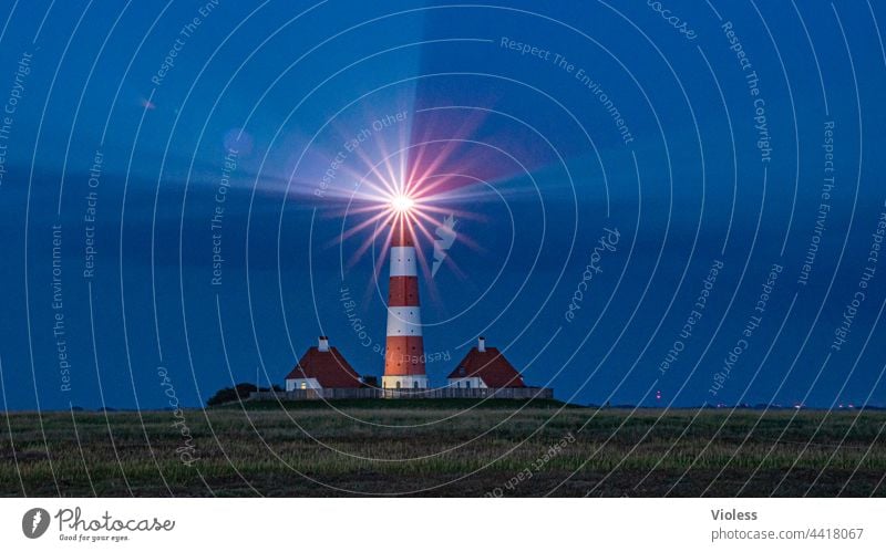 As the land, so the lighthouses Westerhever Lighthouse North Sea Night rays dazzling Blue coast Dark Westerhever lighthouse Landscape Tourism Vacation & Travel