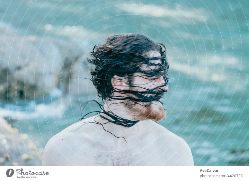 Man with long hair smiling to camera with wet hair, confidence, holiday  concept, portrait, shirtless - a Royalty Free Stock Photo from Photocase