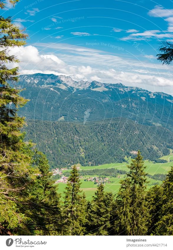Landscape of the Bavarian Prealps in Germany, Europe, village Bäcker. View from the mountain Staffel. Mountain range Bavaria Alps. vertical image