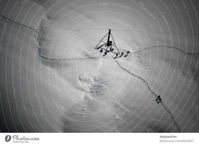 Lots of people and tracks in the snow. Shot in a gondola at the top, on the way to the Zugspitze. Snowscape Cold Winter Landscape Ice Nature Colour photo