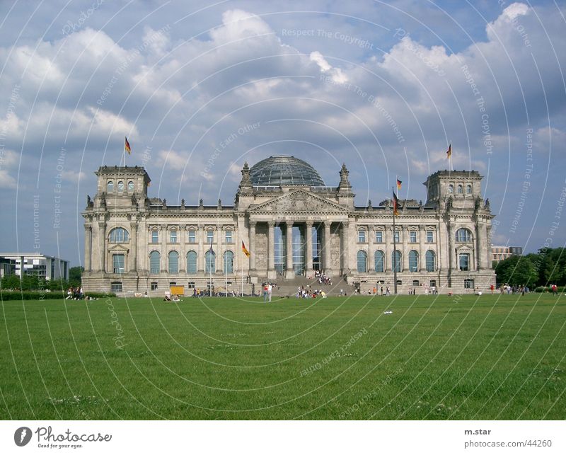 The Reichstag Politics and state Seat of government Meadow Clouds Historic Houses of Parliament Berlin Germany Architecture