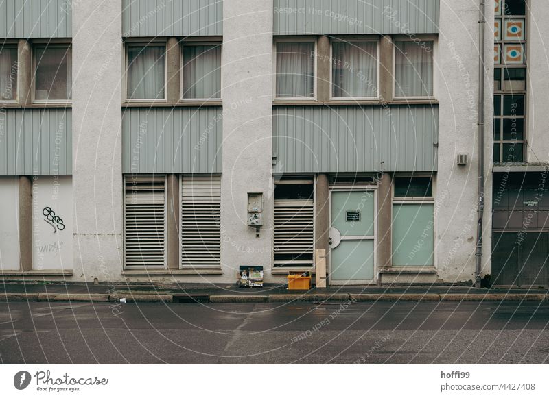 dark gloomy exterior facade of a 70s apartment building Architecture Apartment Building Balconies Dark somber Facade Balcony urban City Design Block