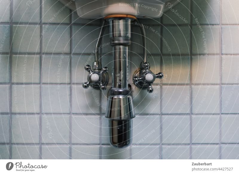 Siphon, taps, water pipes of a sink in front of small square tiles Soda siphon Tap Sink Bathroom bathroom Wash Transmission lines Effluent Porcelain Clean Tile