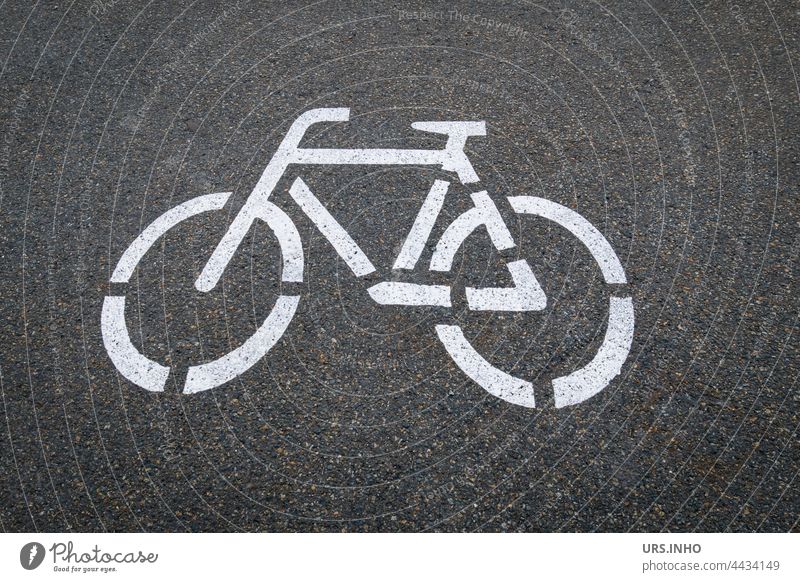 on the dark asphalt is painted the symbol of a white bicycle so that the cyclist keeps the lane Bicycle White Dark Gray Transport off Cycling Asphalt Street