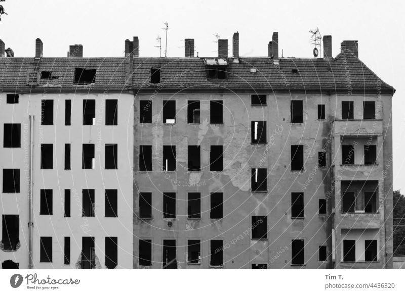 an old building where all the windows have been removed is standing blind Treptow köpenick Old building b/w Black & white photo Architecture Day Building