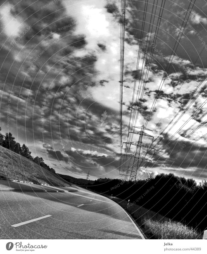 The shadow of the world Sun Cable Sky Clouds Transport Street Lanes & trails Threat Clouds in the sky Cloud shadow Asphalt Median strip Electricity Dike