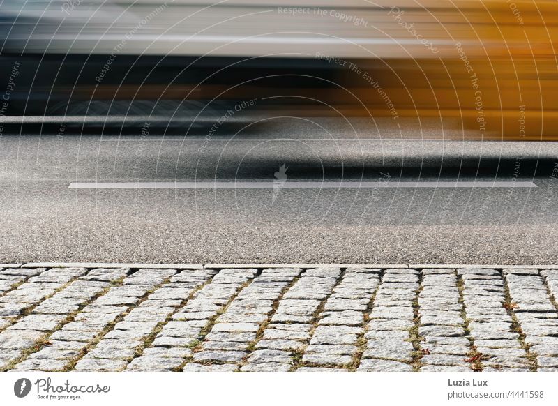 Federal road, speed and play of colours, autumnal Street Speed blurred Movement swift colors Cobblestones Grow hazy blurriness Transport urban Driving