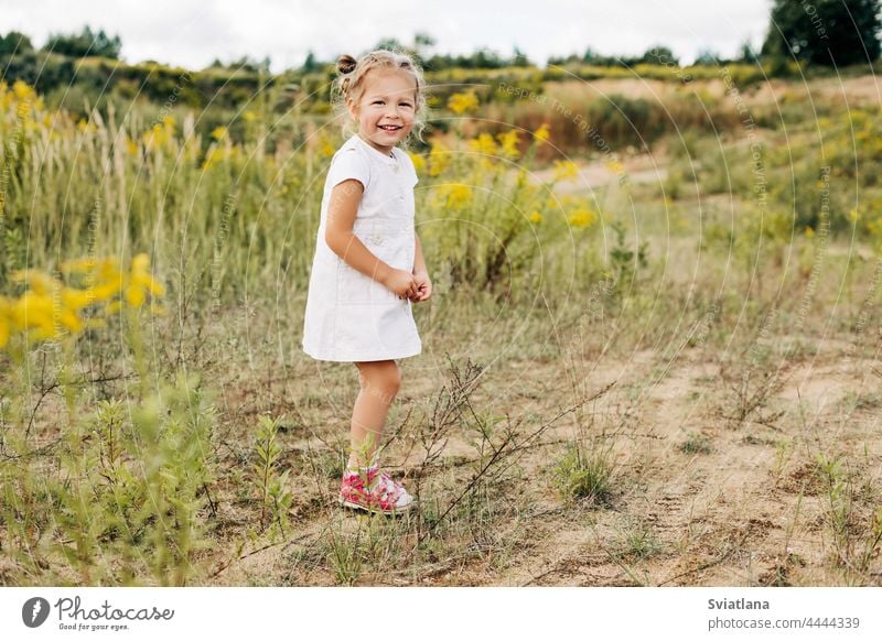 Little girl in white dress Stock Photo by ©nanka-photo 73119561