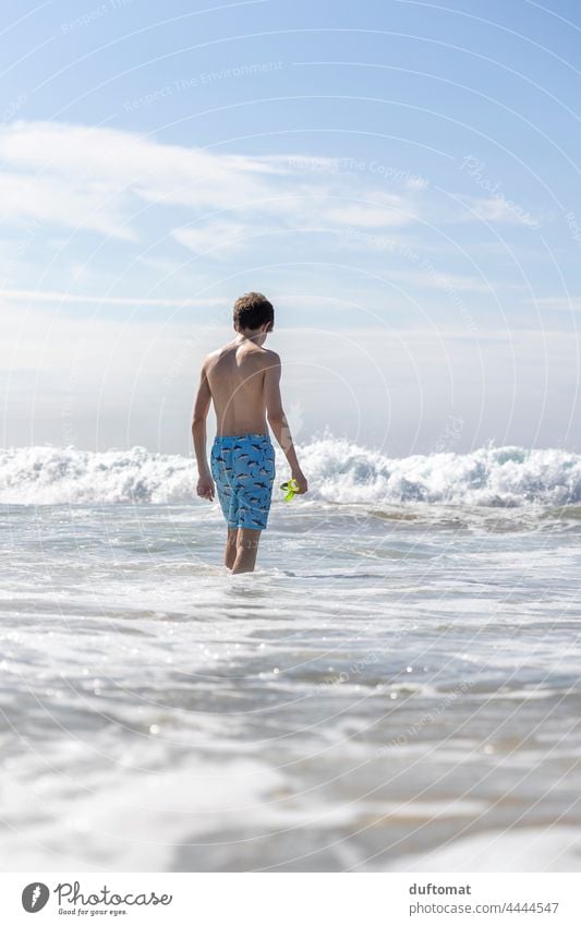 Teen Young Goes Swimming In The Ocean wave Green Young man Summer Water White crest ocean vacation Nature Boy (child) Swimming & Bathing Blue coast