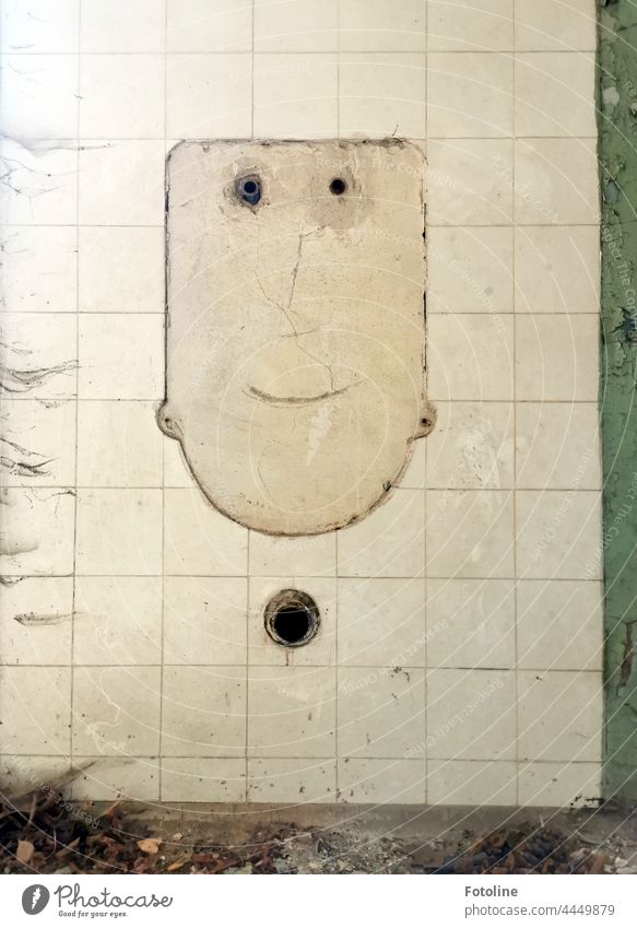 Lost Place - In the tiles a face is silhouetted, smiling at me. Dirt and cobwebs are completely forgotten. lost place forsake sb./sth. Broken Old Derelict