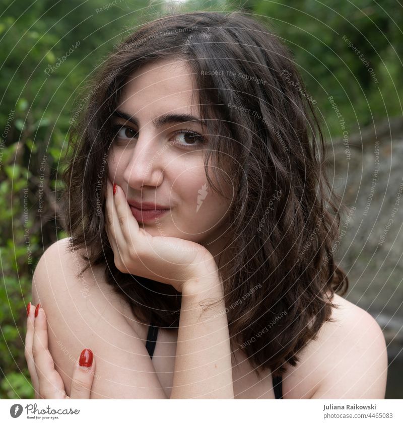 Close-up Portrait of a Beautiful Young Brunette Girl with Big Eyes