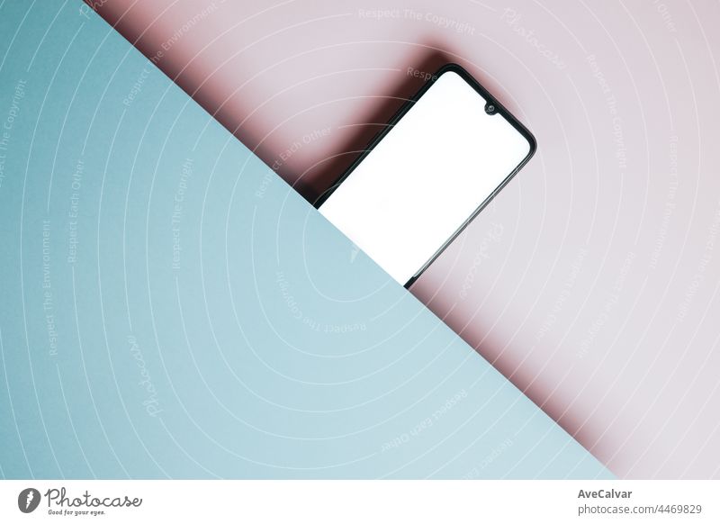 Top view of mobile phone screen blank template on pink and blue background with copy space, minimal design, shapes, colorful background, young style , transgender flag,