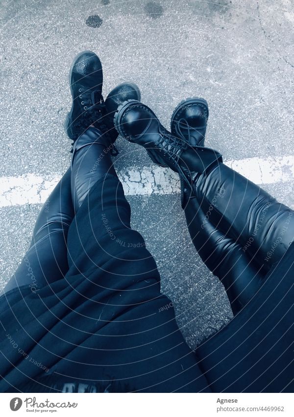 Rock will never die as well as friendship - leather legs friends together Leather Black Legs two persons two women Boots Border crossing foots Asphalt Pants