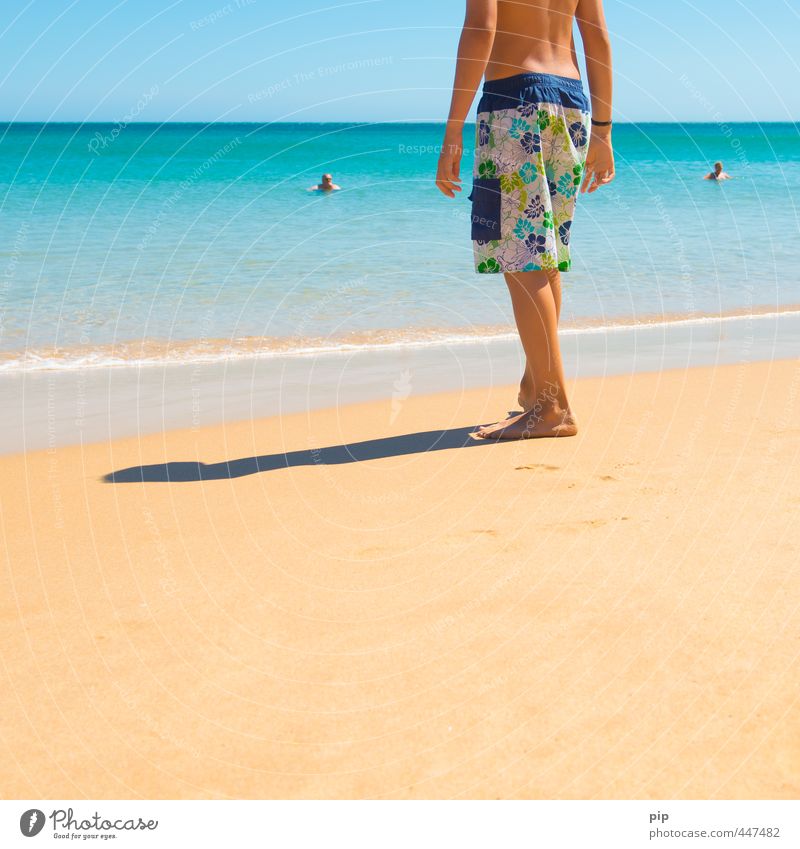 - · | · Human being Boy (child) Young man Youth (Young adults) Life Back Legs Feet 1 Nature Sand Water Summer Beautiful weather Coast Beach Ocean