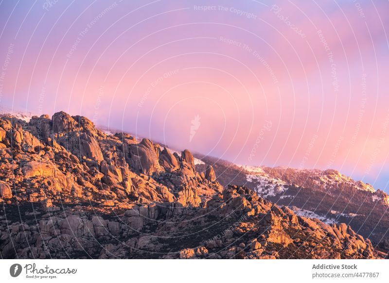 Rocky mountains with clouds morning rock sundown nature sunset terrain highland rough landscape sunrise geology madrid spain sierra de guadarrama national park