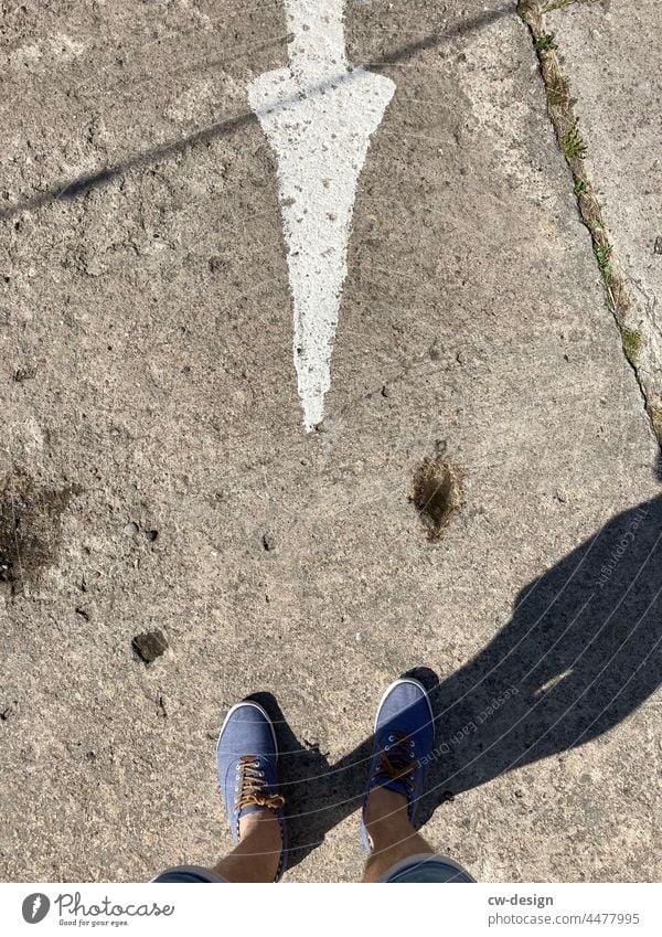 Feet of young man with blue shoes photographed from above feet Man Footwear Concrete Colour