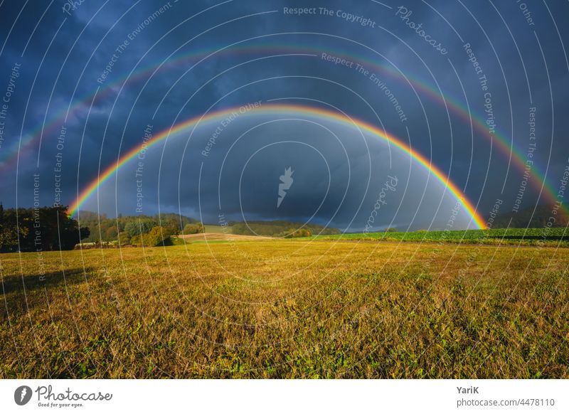 Double Rainbow Sun unsteady Nature naturally Natural phenomenon outdoor Weather April weather variegated colourful Round double Meadow Field Blue sky Raincloud