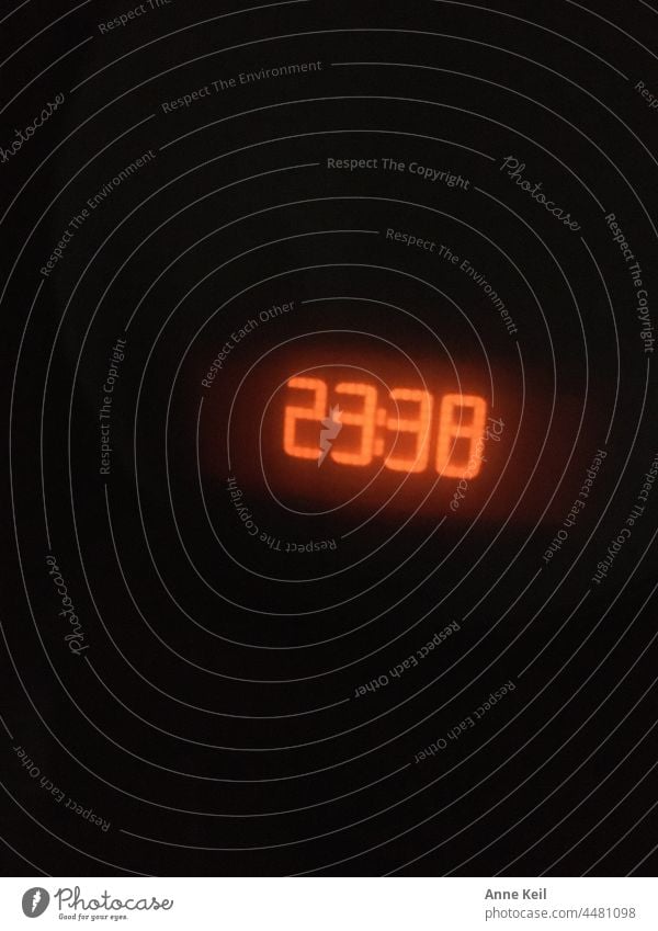 Digital clock display at night Clock hand Time Digits and numbers Detail Prompt Interior shot Deserted Transience Colour photo Alarm clock Accuracy Display