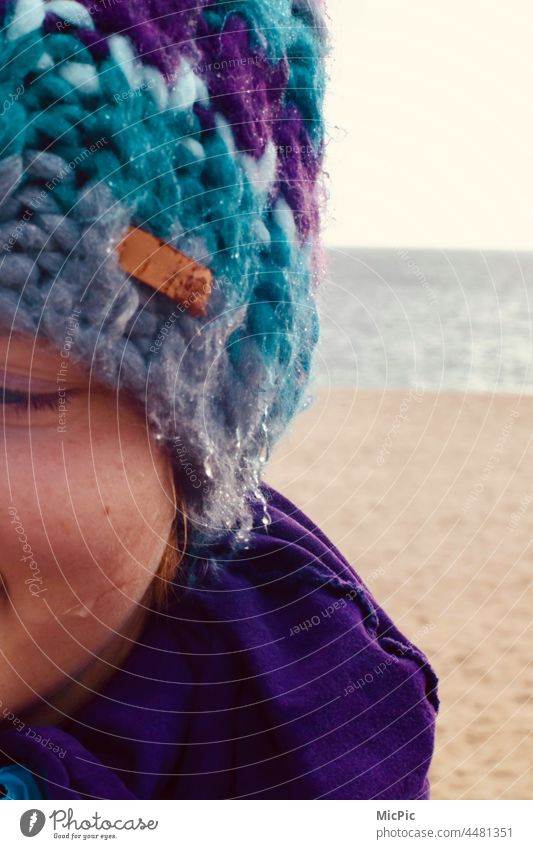 Beautiful wool hat wet rainy weather Cap Wet Rain Drop Wool Woolen hat Knit rope Clothing Cold Winter Fashion Colour photo Soft Face Weather Ocean Beach out
