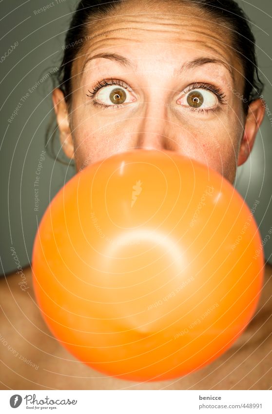 Young woman with balloon Woman Human being Balloon Orange Blow Party Birthday Air Grimace Joy Feminine European Close-up Chewing gum Round