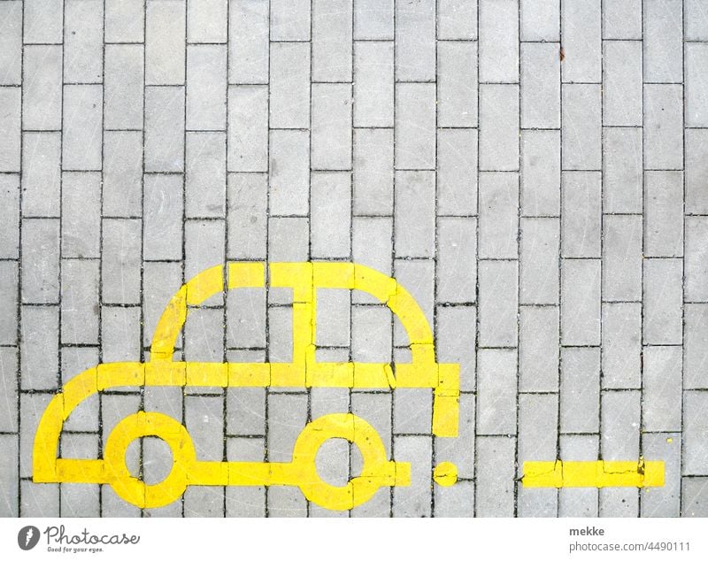 Parking lot marking with yellow car on paved road Car Transport Street Mobility Road traffic Means of transport Vehicle Lanes & trails Traffic infrastructure