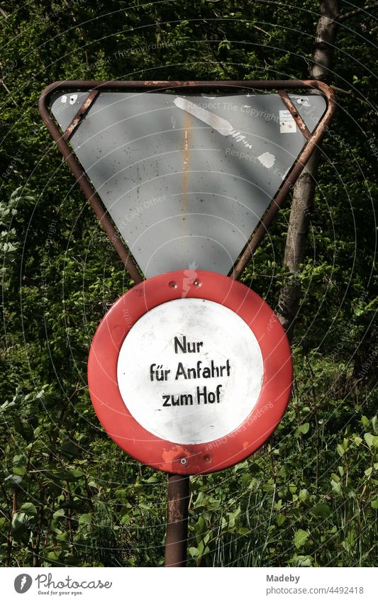 Passage forbidden with round traffic sign in front of blue sky in sunshine  at a construction site on a road in Blomberg in East Westphalia-Lippe,  Germany - a Royalty Free Stock Photo