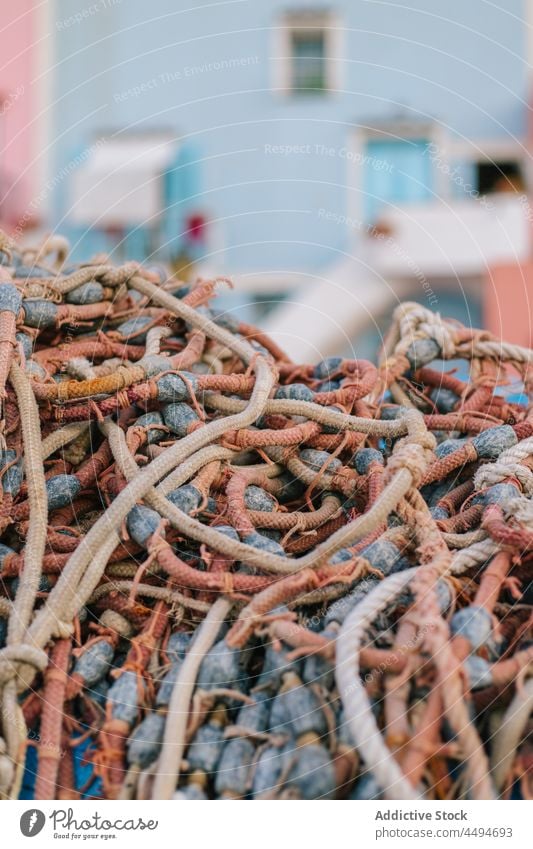 Heap of ropes places on street heap structure colorful element district building residential fishing house detail exterior construction daylight city bright